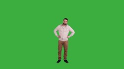 Man impatiently waiting for, and shows that it is time to do something on green screen background Stock Footage