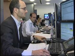 German DAX down in early trade, Paris trading, Moscow halted News Clip