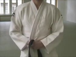 Tying Judogi Stock Footage