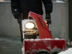 CU ZO TU PAN View of snow blower in Wall St. area / New York, New York, United States Stock Footage