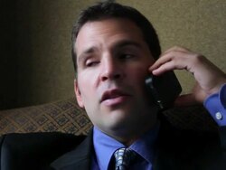 CU Man sitting in chair talking on mobile device / Portland, ME, United States Stock Footage