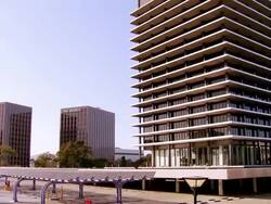 WS TD Department of Water and Power building and employee parking lot covered with array of solar panels / Los Angeles, California, USA Stock Footage