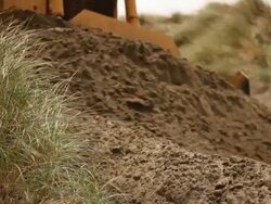 Bulldozer Pushing Sand Stock Footage