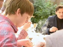 CU Shot of Family lunch outdoors in pub garden, two boys and one girl with dad and granddad / London, England, United Kingdom Stock Footage