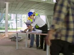 HD CRANE: Architect And Construction Foreman Examining Blueprints Stock Footage