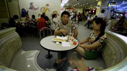 CLEAN : McDonalds holds the beef in China meat scandal News Clip