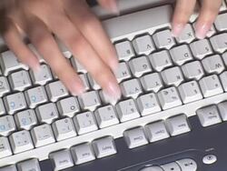 Typing on a computer keyboard Stock Footage