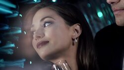 Hollywood starlet gazes from her handsome beau to the paparazzi and turns to face camera at awards show Stock Footage