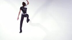 SLO MO CS Male figure skater performing a parallel spin Stock Footage