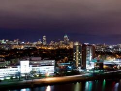 Wide shot Boston, Cambridge, Charles River, night to sunrise Stock Footage
