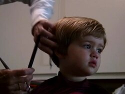 (HD1080i) Cutting Child's Hair Stock Footage