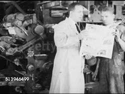 1939: TIME & LIFE CHICAGO:  MS Male on telephone in office. VS Press room workers loading plates, workers inspecting sheets (SOT), 'looks okay... go ahead & run,' hand pressing button, printing press making copies, rollers, of Time & Life. Time Life Instructional Video