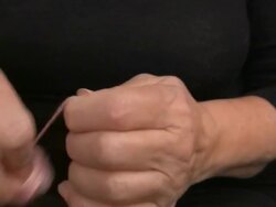 Closeup of Lady's Hands Winding Wool into a Ball Stock Footage