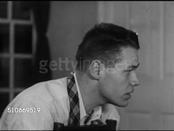 1951: HARVARD UNIVERSITY: DRAMATIZATION: 'Ray' Filling out housing choice application on manual typewriter, talking w/ two unidentified male friends about choosing Lowell House, mentioning Kirkland & Adams, picking Winthrop as second choice Instructional Video