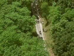  MS AERIAL TS Shot of rack railroad tracks with pedestrians / Kalavryt, Peloponnese, Greece Stock Footage