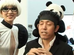 VOICED: Chinese 'panda artist' puts icon on Paris catwalk News Clip