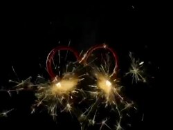 Heart shaped sparkler burning Stock Footage