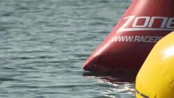 Alice Dearing swimming in a large Lake News Clip