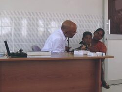 MS Mother with sick child visiting doctor / Batticaloa, East Sri Lanka, Sri Lanka Stock Footage