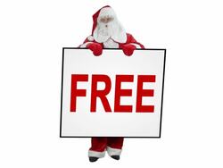 Santa Claus holds "FREE" sign - 3 shots Stock Footage