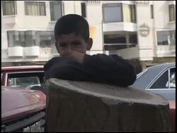 2003 MONTAGE Pre-war Iraq / WS MS Street scenes / Iraq  Stock Footage