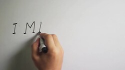 Hand writing title 'I MISS YOU' on white board Stock Footage