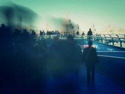 People walk on the Millennium Bridge Stock Footage