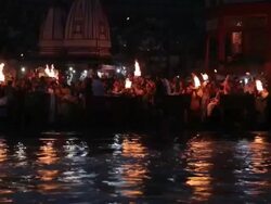Pilgrims doing aarti of river at night, Ganges River, Haridwar, Uttarakhand, India Stock Footage