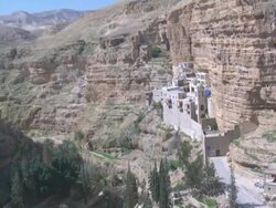 Aerial Saint George Monastery in the Wadi Kelt, Judean desert, Israel Stock Footage