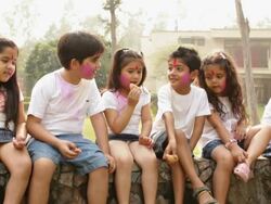 Group of kids eating gujia in holi festivals Stock Footage