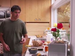 MS Man in kitchen, standing, eating cereal / Portland, Oregon, United States Stock Footage