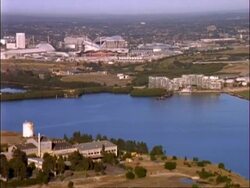 WA aerial tracking over Sydney Olympic complex, Sydney, Australia Stock Footage