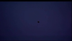 A weather balloon ascends into the night sky. Stock Footage