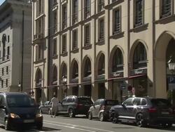MaximilianstraÃƒÂŸe, street, cars, boutiques, blue sky, people Stock Footage