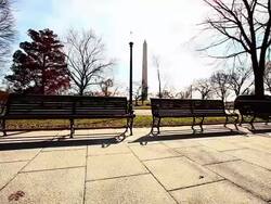 Long distance dolly shot of Washington Monument in Washington DC Stock Footage