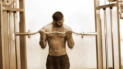 Body Builder Performing Barbell Curl Exercise inside the Gym Stock Footage