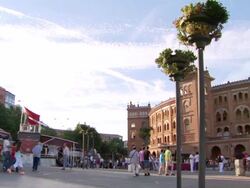 WS PAN Shot of people roaming at Plaza de Toros outside / Marid, Spain Stock Footage