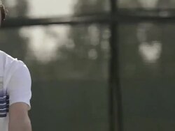 CU ECU of a man serving a tennis ball and celebrating an ace serve. Stock Footage