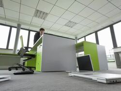 Stop Motion shot of businessman watching laptops turning like sharks on an office ground Stock Footage