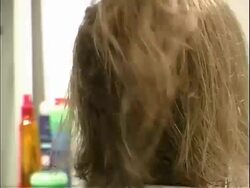 Customer getting her haircut at the Hair salon Stock Footage
