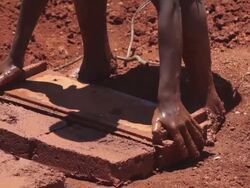 Bricks Being Removed From Form Stock Footage