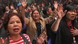 US evangelist leads Christian event at Hanoi stadium Instructional Video