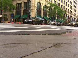 Low Angle Shot Of Cars Driving On Street Stock Footage