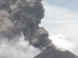 Volcanic ash belches from crater of Anak Krakatau volcano, Krakatoa, Indonesia, November 2010 Stock Footage