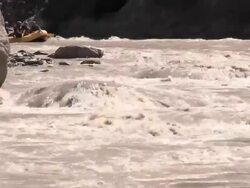 Rapids and group of people white water rafting Stock Footage