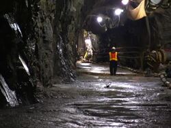 A waste management worker walks through a sewer system tunnel below New York City. Stock Footage