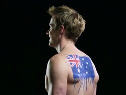 Man with Australian flag painted on back Stock Footage