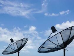 HD time lapse of satellite dish with clouds move Stock Footage