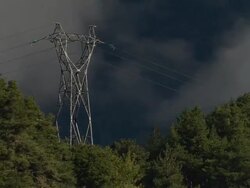AERIAL WS Pylon surrounded by trees on hill in Maritime Alpes / Rhone-Alpes, France Stock Footage