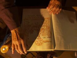 HD: Scribe Examining Sacred Sketches Stock Footage